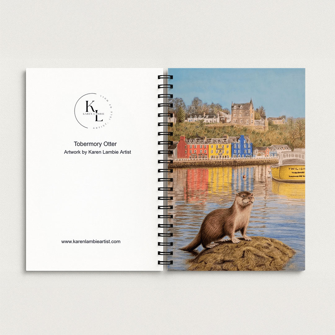 Spiral Notebook A5 - Flat lay of closed notebook featuring charming Tobermory otter illustration in landscape format